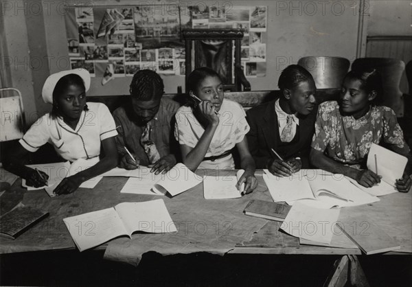 Students writing, 1935 - 1943.