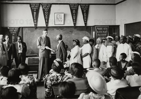 Carl W. Huser, State Director of WPA education program, presenting awards, 1935 - 1943.