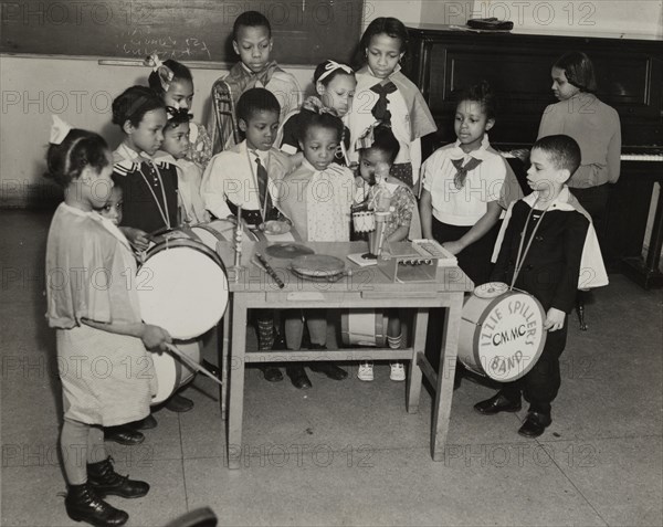 Drum students around a table, 1938.