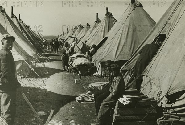 African Americans at Forrest City flood refugee camp, Arkansas, 1930s.  Creators: Farm Security Administration, Edwin Locke.