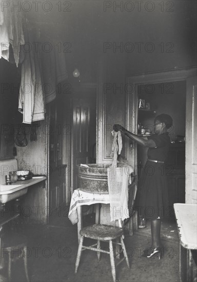 Kitchen of apartment occupied by Negroes, South Side of Chicago, Illinois, April 1941.