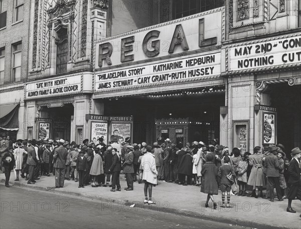 The movies are popular in the Negro section of Chicago, Illinois, April 1941.