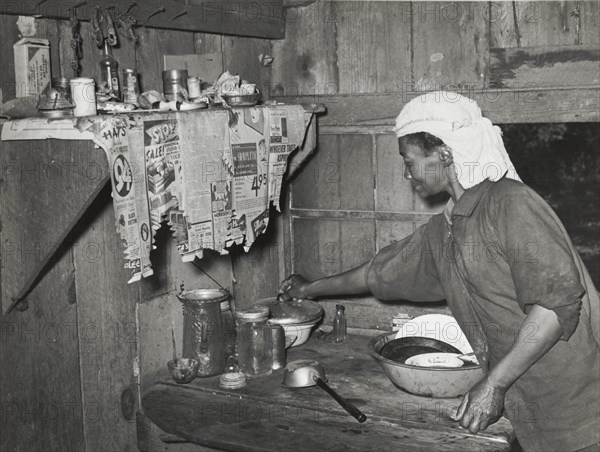 Negro tenant farmer who grew strawberries on shares near Hammond, Louisiana..., April 1939. Creators: Farm Security Administration, Russell Lee.