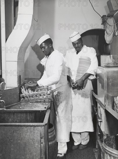 African American restaurant workers, Investment Pharmacy, Washington, D.C., July 1941.