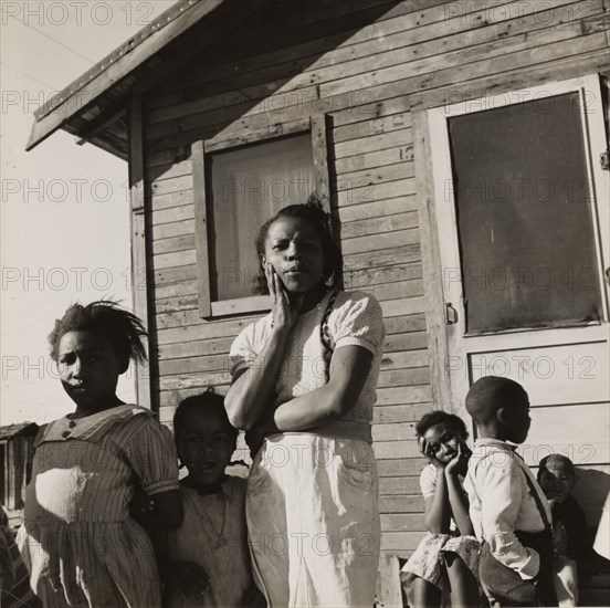 Colored family from near Houston, Texas. Been in California for two years. Husband came..., 1939. Creators: Farm Security Administration, Dorothea Lange.