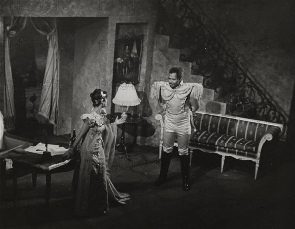 Woman in evening dress and Rex Ingram, 1938.