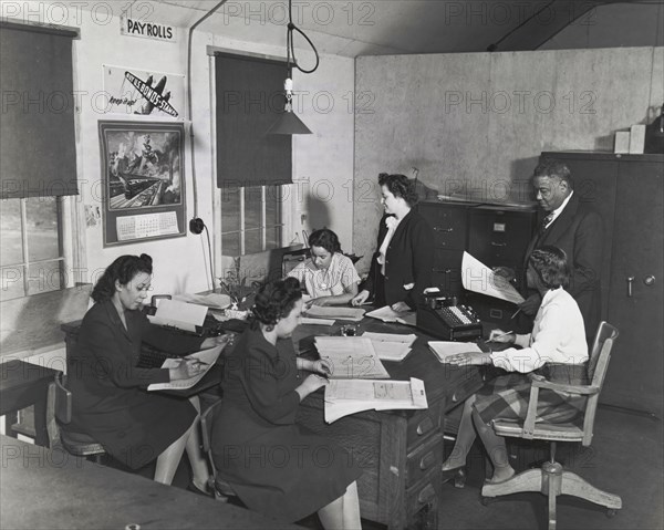 Plato's office staff for Wake and Midway Halls; Samuel Plato, contractor, and part..., March 1943. Creator: Roger Smith.