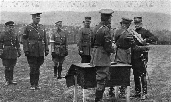 'Une ceremonie militaire a Salonique; Le general Sarrail decore par le general Mahon..., 1916. Creator: Unknown.