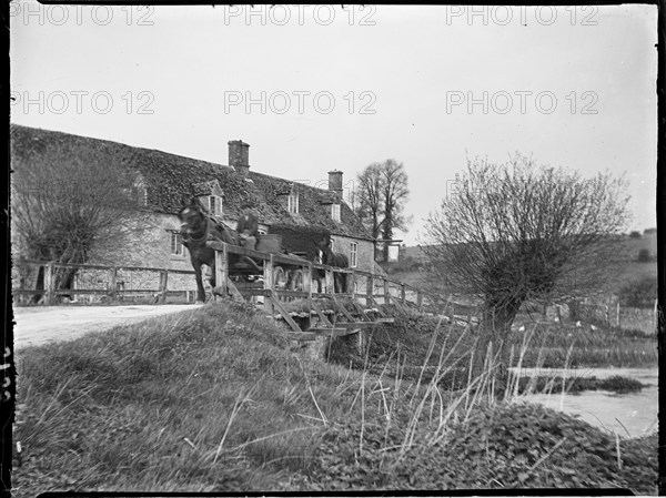 The Swan Inn, Swinbrook, Swinbrook and Widford, West Oxfordshire, Oxfordshire, 1924. Creator: Katherine Jean Macfee.