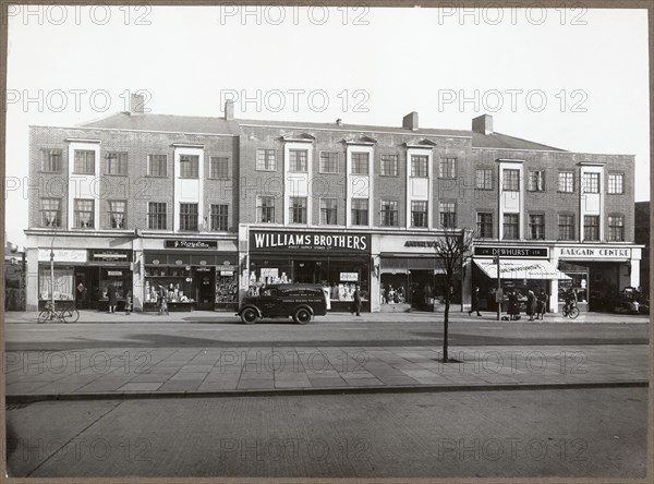 2-12 Church Road, Ashford, Spelthorne, Surrey, 1939-1950. Creator: Healey and Baker.