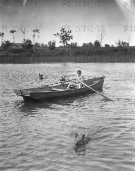 Lewisohn, Walter, Master, in a rowboat, 1926? Creator: Arnold Genthe.