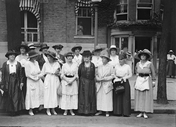 Woman Suffrage - Groups at Headquarters, 1917. Creator: Harris & Ewing.