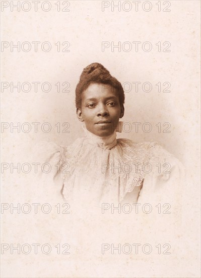 Studio portrait of a woman, c1890-c1899. Creators: Van Wagner, Unknown.