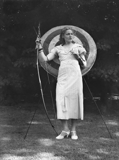 Chase, Diana, Miss, doing archery, 1933 June 22. Creator: Arnold Genthe.