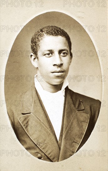 Studio portrait of unidentified young man, c1870-c1879. Creator: M Stahn.