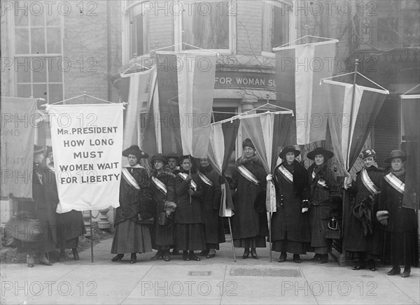 Woman Suffrage - Group Leaving Headquarters, 1917. Creator: Harris & Ewing.