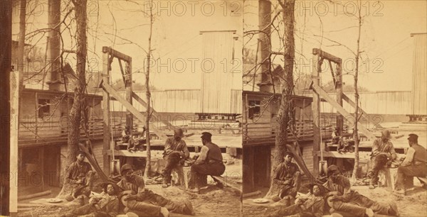 North Carolina. Negro boatmen at lunch, c1850-c1930. Creator: Rufus Morgan.
