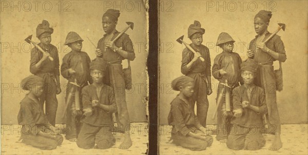 Studio portait of young chimney sweeps, (1868-1900?). Creator: J. N. Wilson.