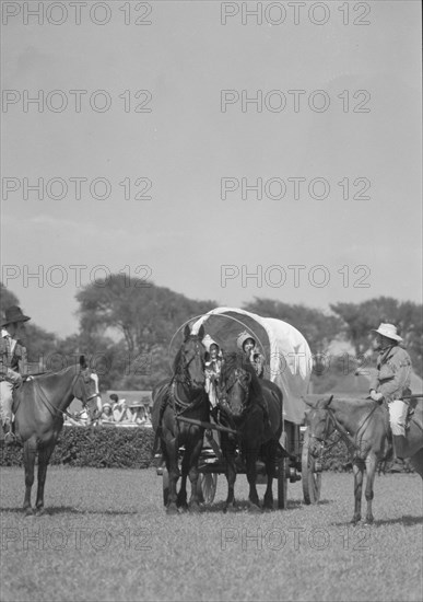 Horse show or show jumping event, between 1911 and 1942. Creator: Arnold Genthe.