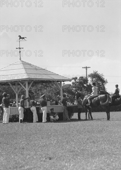 Horse show or show jumping event, between 1911 and 1942. Creator: Arnold Genthe.