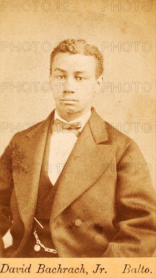 Half-figure portrait of man wearing bow tie, c1870-c1879. Creator: David Bachrach.