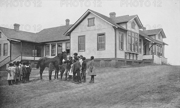 The children's house: class in nature study, 1904. Creator: Frances Benjamin Johnston.