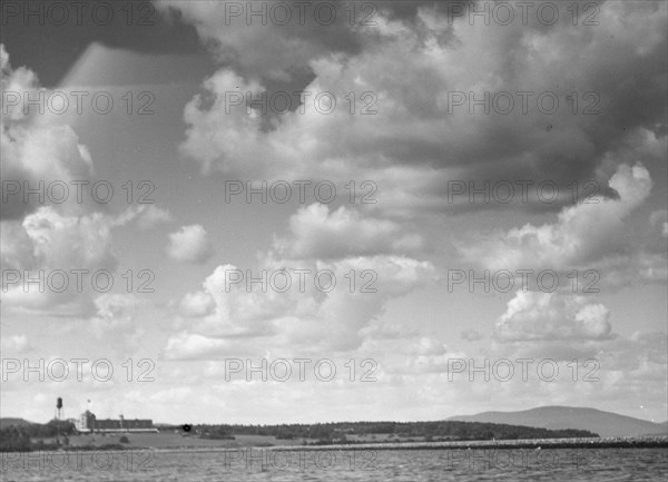 View of the Baldrige estate from across the water, 1931 July 25. Creator: Arnold Genthe.