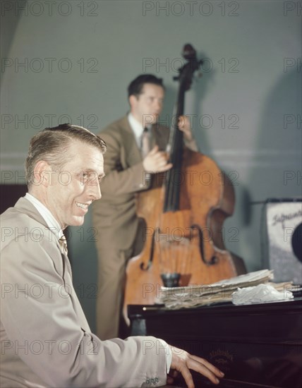 Portrait of Stan Kenton and Eddie Safranski, 1947 or 1948. Creator: William Paul Gottlieb.