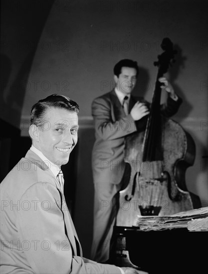 Portrait of Stan Kenton and Eddie Safranski, 1947 or 1948. Creator: William Paul Gottlieb.