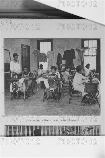 Learning to sew at the Gaudet School; [New Orleans, Louisiana], (1923?). Creator: Unknown.