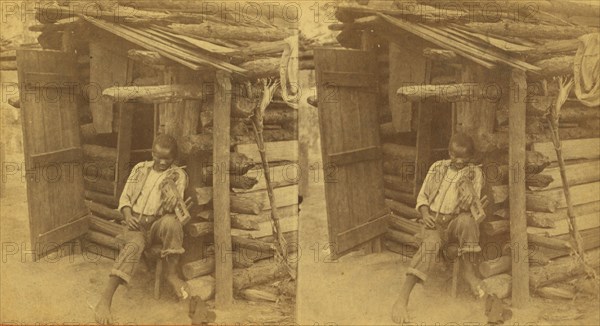 Happy little Bob. [Man playing fiddle in front of cabin], (1868-1900?). Creator: O. Pierre Havens.