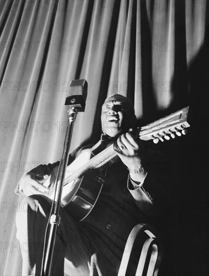 Portrait of Leadbelly, National Press Club, Washington, D.C., 1938. Creator: William Paul Gottlieb.