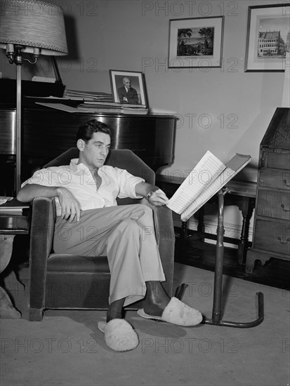 Portrait of Leonard Bernstein in his apartment, New York, N.Y., 1946. Creator: William Paul Gottlieb.