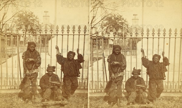Let brotherly love prevail. [Young chimney sweeps leaning on a fence], (1868-1900?). Creator: Unknown.