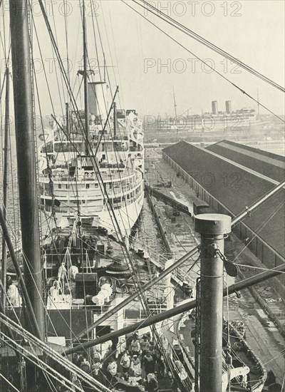 The Traffic Still Quickens; Still The Vessels Grow Bigger Liners In Tilbury Docks', 1937. Creator: Fox.