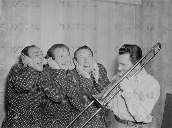 Portrait of Buddy Morrow and Ritz Brothers, New York, N.Y., ca. May 1947. Creator: William Paul Gottlieb.