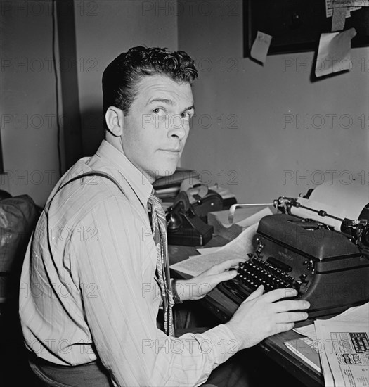 Portrait of Eddie Ronan, Down Beat office, New York, N.Y., ca. Mar. 1947. Creator: William Paul Gottlieb.