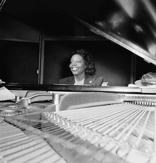 Portrait of Mary Lou Williams, CBS studio, New York, N.Y., ca. Apr. 1947. Creator: William Paul Gottlieb.