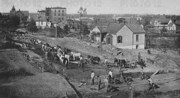 Digging foundation for a new building on the Institute grounds, 1904. Creator: Frances Benjamin Johnston.