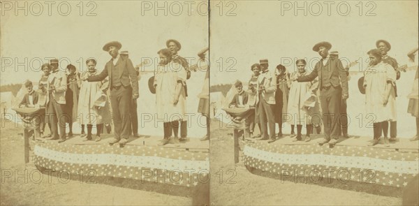 A side show at Chatham Fair, [Musical performers on a small outdoor stage], (1868-1900?). Creator: Unknown.