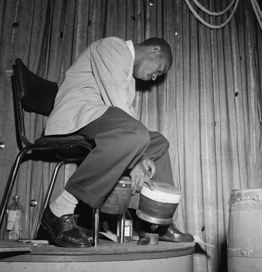 Portrait of Jose Mangual, Glen Island Casino, New York, N.Y., ca. July 1947. Creator: William Paul Gottlieb.