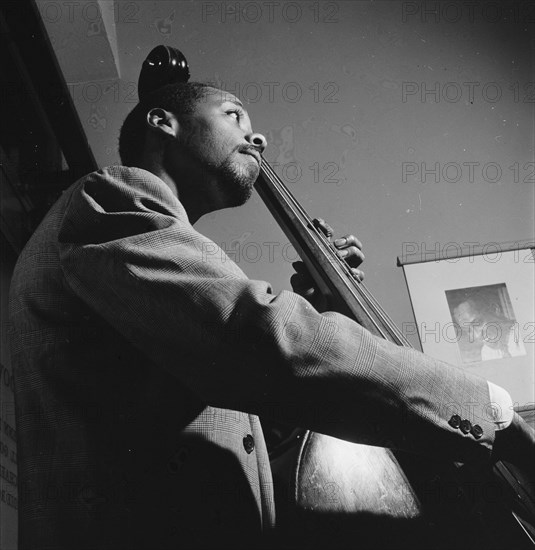 Portrait of Slam Stewart, William P. Gottlieb's office, New York, N.Y., 1946. Creator: William Paul Gottlieb.