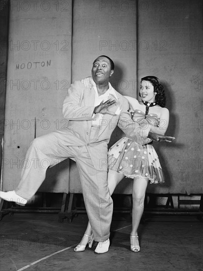 Portrait of Louis Jordan, Paramount Theater(?), New York, N.Y., ca. July 1946. Creator: William Paul Gottlieb.