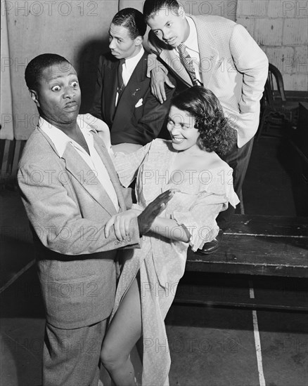 Portrait of Louis Jordan, Paramount Theater(?), New York, N.Y., ca. July 1946. Creator: William Paul Gottlieb.