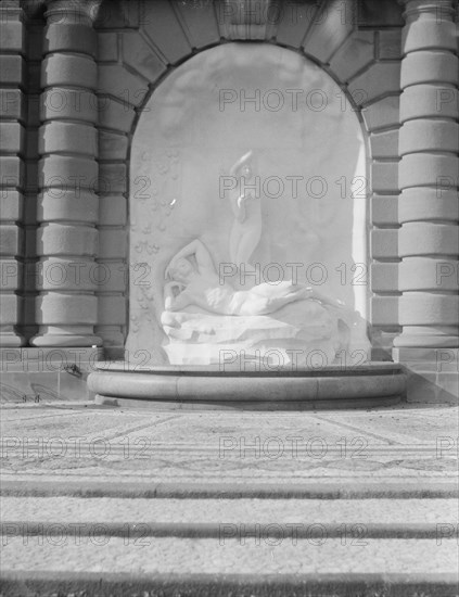 Fountain and sculpture in the gardens at Kijkuit, John D. Rockefeller's estate..., 1917 Creator: Arnold Genthe.