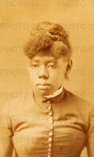Portrait of unidentified young woman with buttoned bodice and band collar, (1880-1889?). Creator: H. A. Insley.