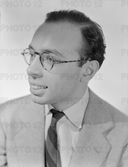 Portrait of Ahmet M. Ertegun, William P. Gottlieb's home, Arlington, Va.(?), 1930. Creator: William Paul Gottlieb.