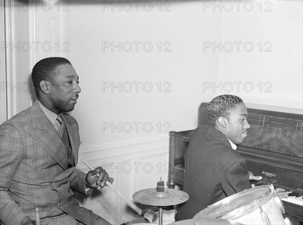 Portrait of Tommy Myles and John Malachi, Turkish Embassy, Washington, D.C., 1938. Creator: William Paul Gottlieb.