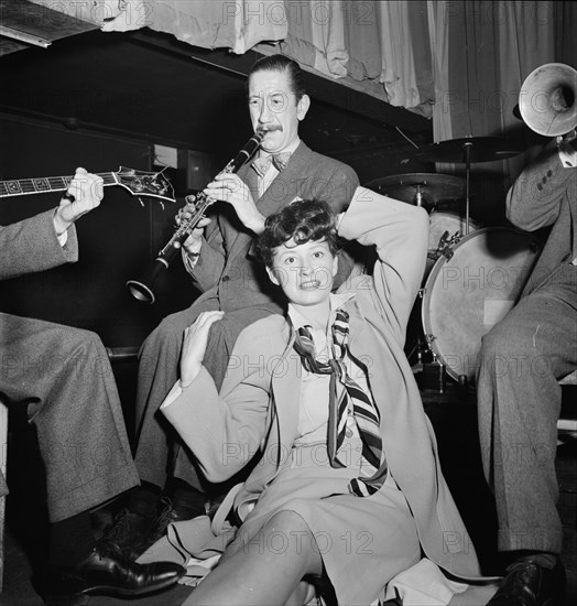 Portrait of Pee Wee Russell and Linda Keene, Eddie Condon's, New York, N.Y., 1946. Creator: William Paul Gottlieb.