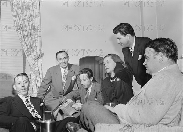 Portrait of Stan Kenton, Carlos Gastel, and Bob Gioga, New York, N.Y., 1947 or 1948. Creator: William Paul Gottlieb.